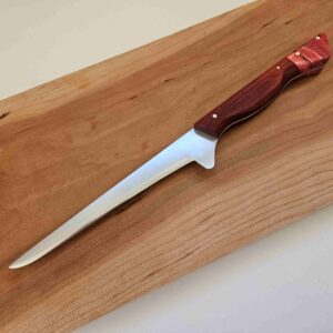 Boning knife with red hardwood handle and 7" blade